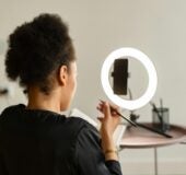 Person is being recorded writing in a book