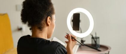 Person is being recorded writing in a book