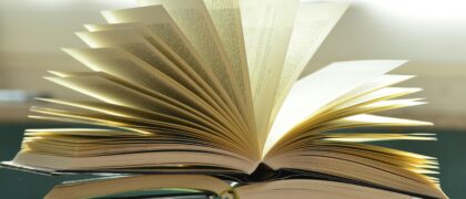 A book that is opened with the pages turning